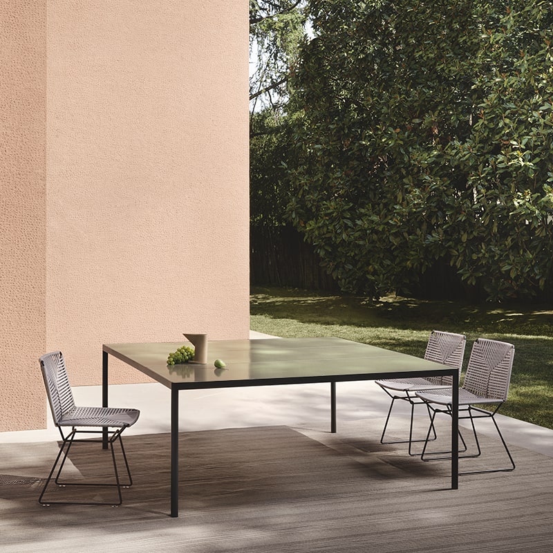 Offset Versatile Indoor/Outdoor Italian Table ☞ Use: Indoor ☞ Structure: Matt Painted Lead Black X138 ☞ Top: Reconstructed Stone Sage Green X161