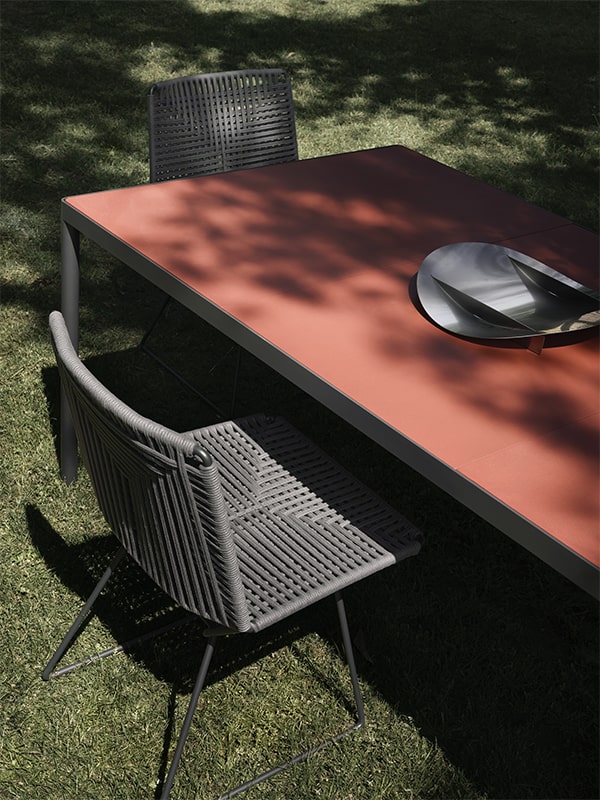 Offset Versatile Indoor/Outdoor Italian Table ☞ Use: Outdoor ☞ Structure: Matt Painted Lead Black X138 ☞ Top: Reconstructed Stone Pink Onyx X134