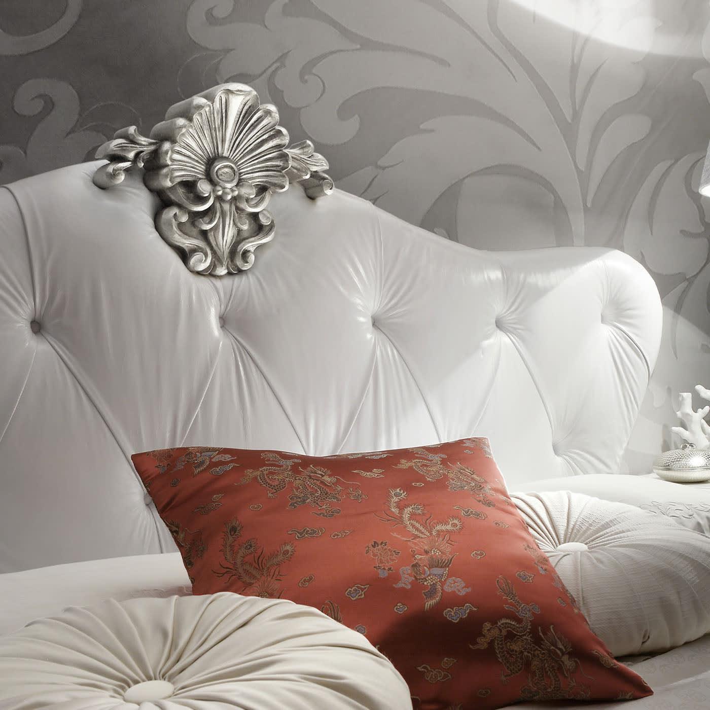 Bed with White Leather Headboard