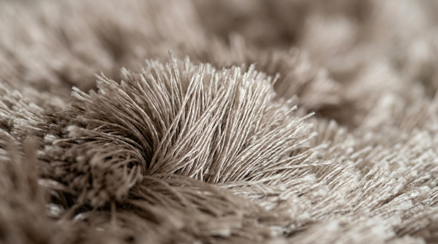 Close-up of viscose rug fibers showing soft sheen and smooth texture